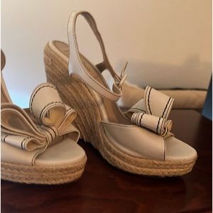 Valentino wedge platform shoes with bows.